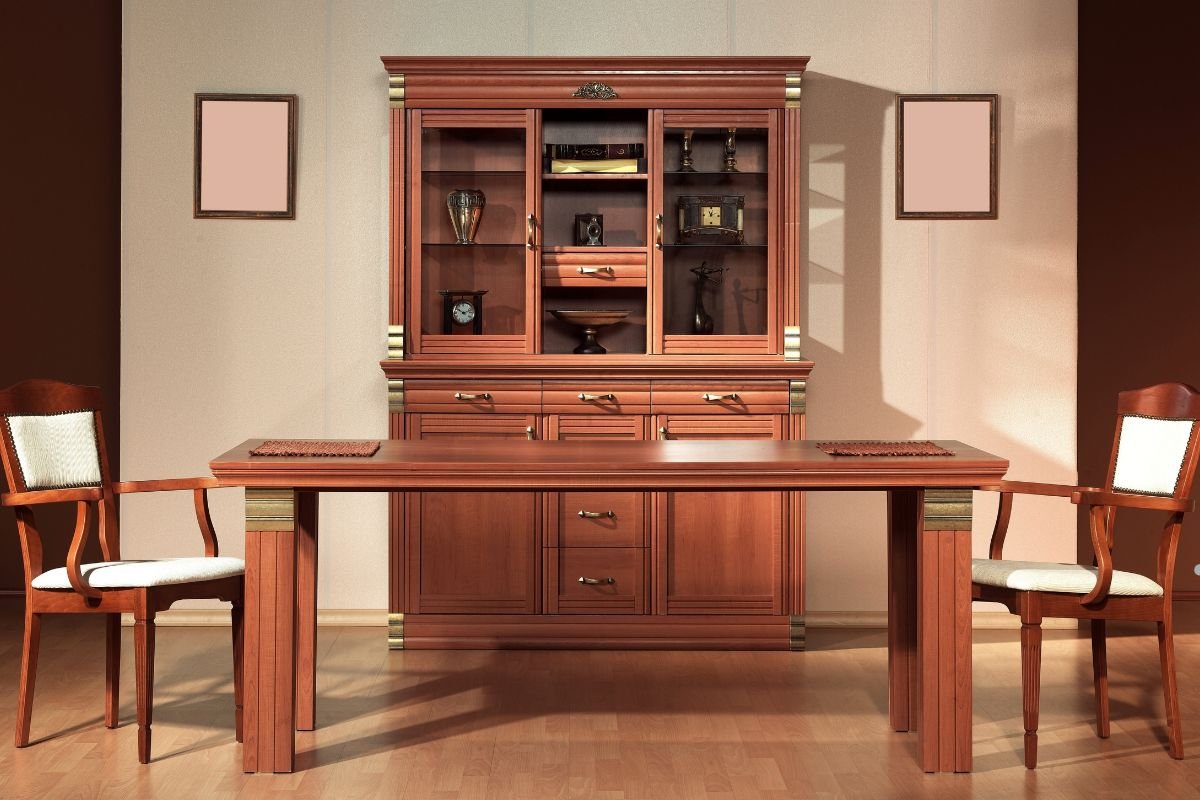 Wooden table and chairs arranged in a cozy room, showcasing a furniture service setup.